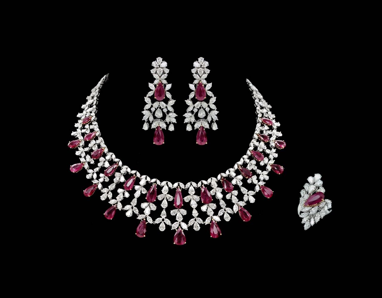 Ruby and diamond necklace, earring and ring set