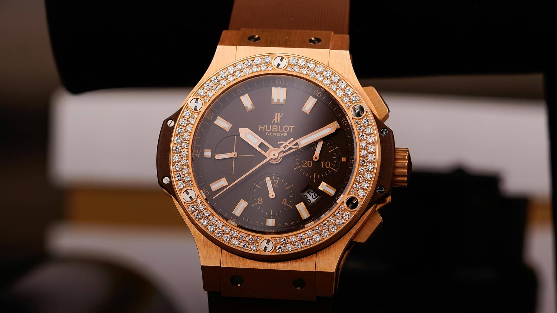 Stone-set watch with a brown strap in our diamond watches in Dubai guide